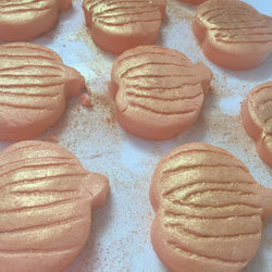 Golden Pumpkin bubble bars scented with pumpkin spice and coated in gold mica.